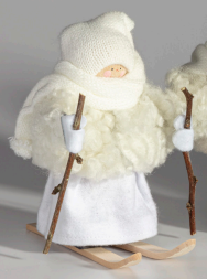 JÓLASTELPA - á skíðum hvít húfa og jakki